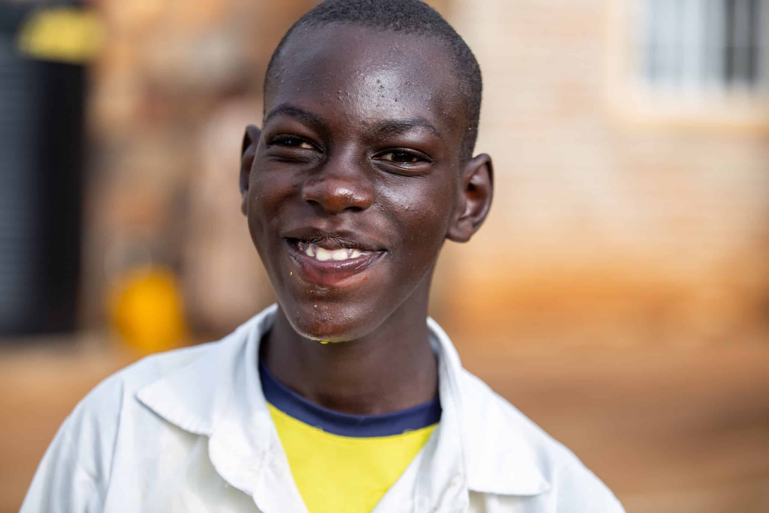 Image is of a young man, Peter, smiling