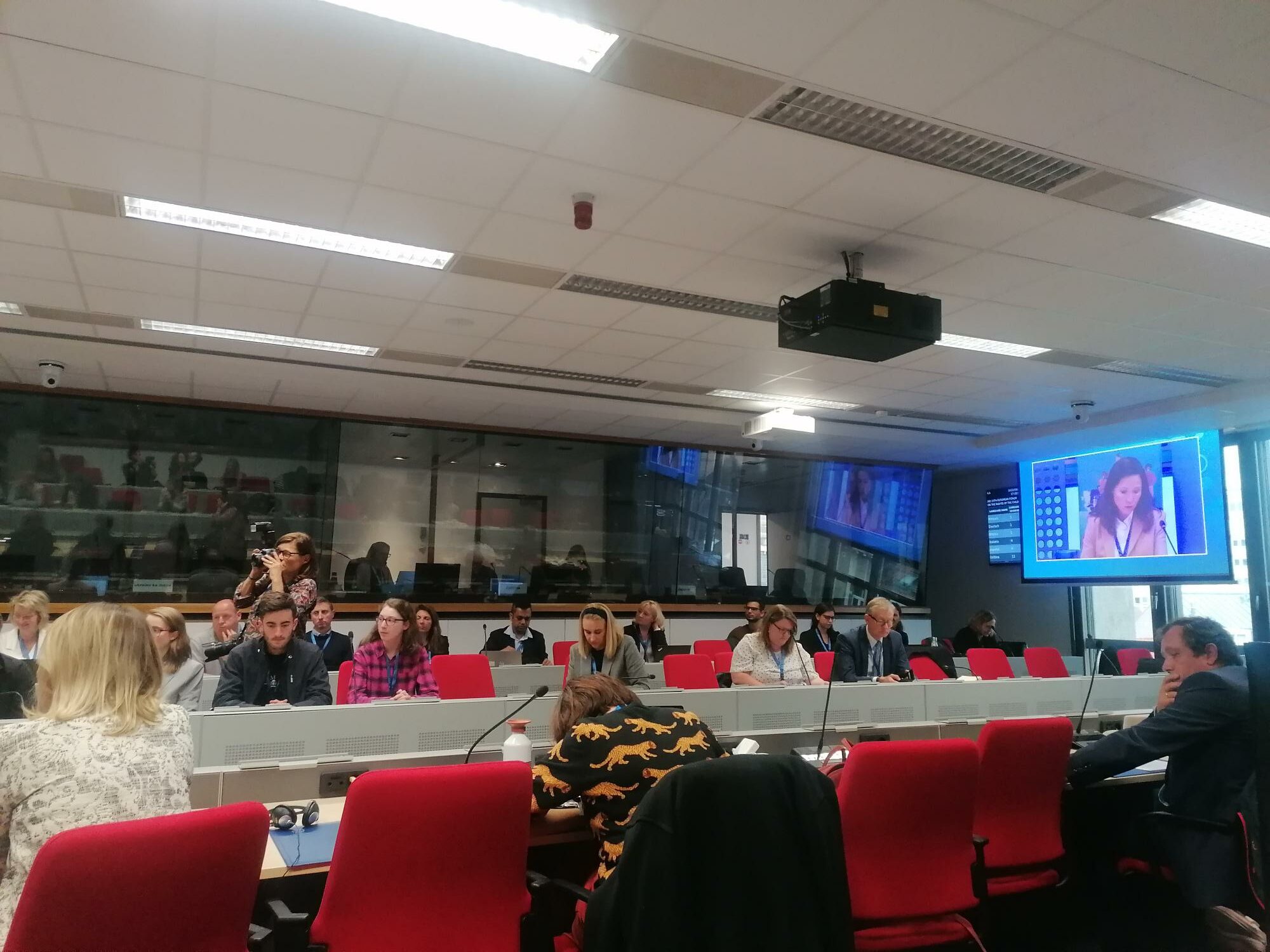 Professionals sat around desks at the EU Child Rights Forum