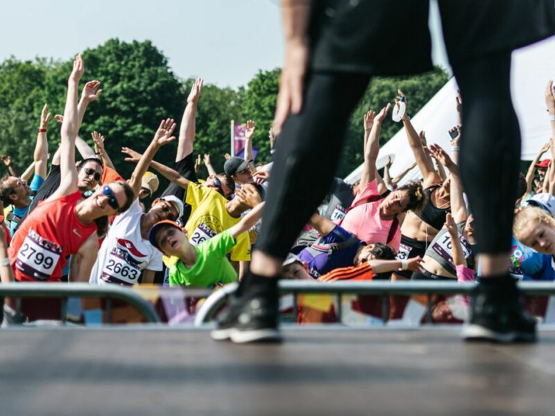 A persons feet on a stage at a music event